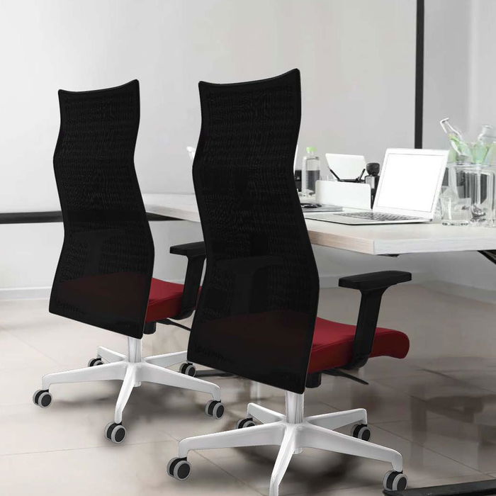 Sillón Albacete con mecanismo Sincro tapizada con Similpiel color Pistacho y malla color Gris. Equipado con Base poliamida blanca, Brazos 2D y Ruedas 65 mm parqué