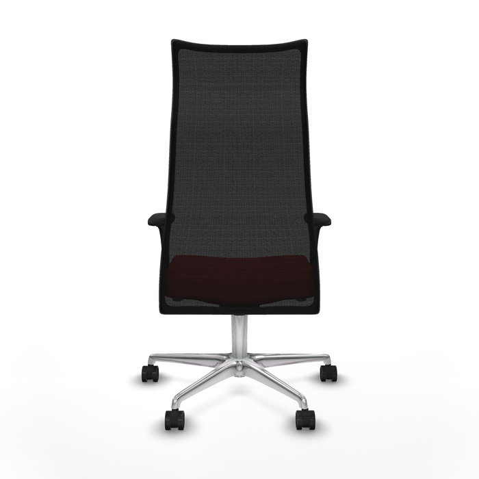 Sillón Albacete con mecanismo Sincro tapizada con Similpiel color Rojo y malla color Negro. Equipado con Base aluminio, Brazos 1D y Ruedas 65mm nailon