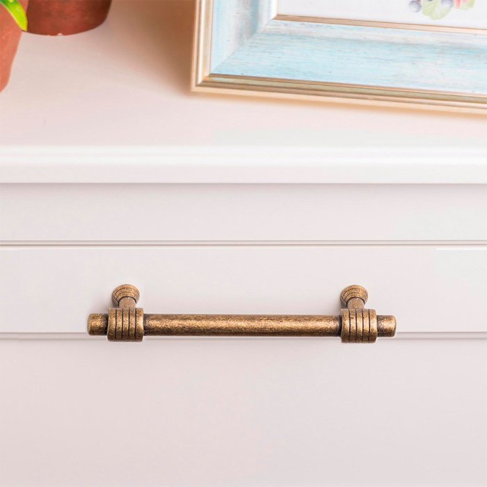 Rei Tirador de mueble asa modelo 180m, Zamak acabado oro viejo, distancia 96 mm, Blíster 4 unidades Rei Tirador de mueble asa modelo 180m, Zamak acabado oro viejo, distancia 96 mm, Blíster 4 unidades