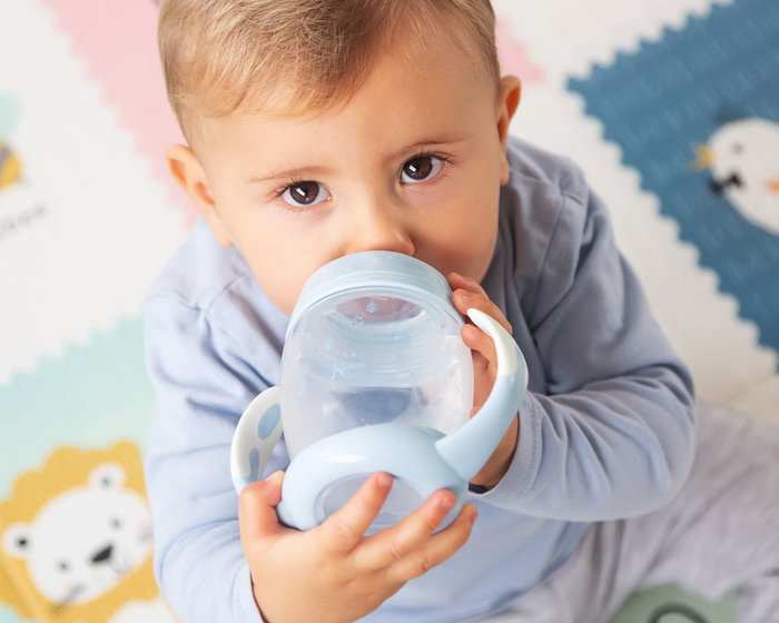 KioKids Taza de Aprendizaje Antiderrames para Bebé desde 6 Meses, Step 1, Azul, 270 ml, Tetina de Silicona Suave con Sistema Anticólico y Asas