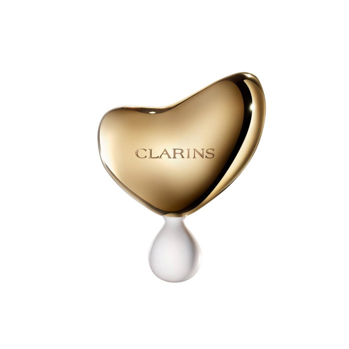 Clarins Precious Oro Piedra de masaje facial