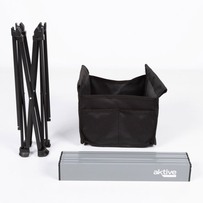 Aktive Mesa auxiliar plegable de camping con zona de almacenaje Aktive Mesa auxiliar plegable de camping con zona de almacenaje