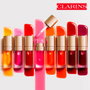 Clarins Lip Comfort Aceite de Labios con Color #02 Raspberry 7 ml - Bálsamo Labial, 93% Ingredientes Naturales, Hidratación y Nutrición