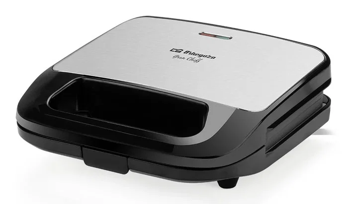 Orbegozo SW 7560 Sandwichera Eléctrica 750 W con 3 Placas Intercambiables (Sándwich, Grill, Gofres), Antiadherente, Negro y Plata Orbegozo SW 7560 Sandwichera Eléctrica 750 W con 3 Placas Intercambiables (Sándwich, Grill, Gofres), Antiadherente, Negro y Plata