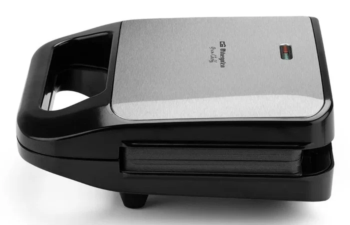 Orbegozo SW 7560 Sandwichera Eléctrica 750 W con 3 Placas Intercambiables (Sándwich, Grill, Gofres), Antiadherente, Negro y Plata Orbegozo SW 7560 Sandwichera Eléctrica 750 W con 3 Placas Intercambiables (Sándwich, Grill, Gofres), Antiadherente, Negro y Plata
