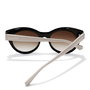 Hawkers #Black And White Earth Gafas de Sol para Adultos Redondeadas Vintage Negro Dorado Rosa