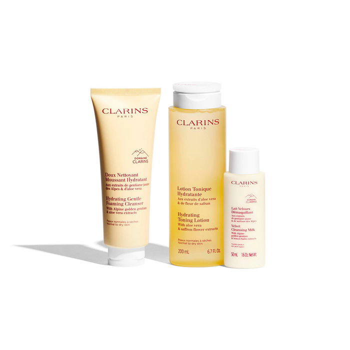 Clarins Estuche Esencial de Limpieza 4 Piezas para Pieles Normales-Secas - Espuma Limpiadora 125 ml, Loción Tónica 200 ml, Leche Desmaquillante 50 ml, Neceser