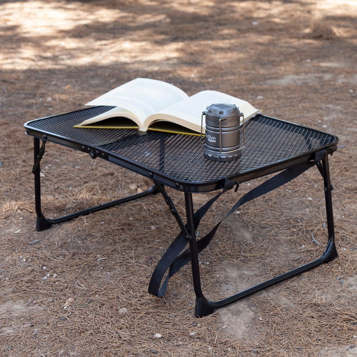 Aktive Mesa plegable de camping negra con diseño maletín y sistema antivuelco