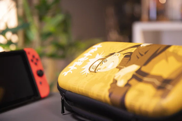 Konix Funda Protectora Rígida para Nintendo Switch y Switch Lite, Diseño Naruto, Multicolor, con Asa, Cremallera y Almacenamiento para Tarjetas