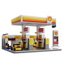 Deqube Gasolinera Shell 1309 Pzas. Set de Construcción Oficial con Tienda Detallada y Accesorios para +8 Años