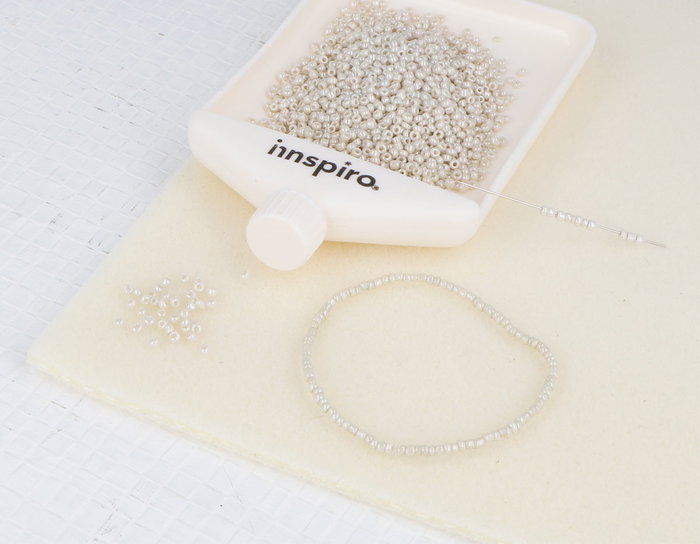 Innspiro Rocalla de vidrio redonda ivory 4 tonos 2,3mm 10/0 500gr Innspiro Rocalla de vidrio redonda ivory 4 tonos 2,3mm 10/0 500gr
