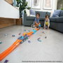 Hot Wheels Super Transportador Expandible con Pista de Carreras de 182 cm