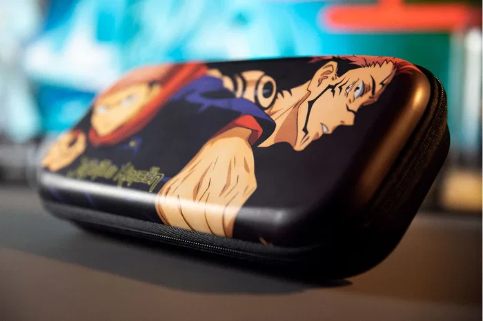 Konix 82441120432 Funda/Estuche para Nintendo Switch y Lite - Diseño Jujutsu Kaisen, Negro/Marrón, PVC, Cremallera, 8 Ranuras para Juegos