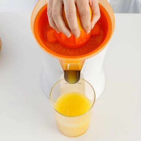 Taurus CITRUS UP Exprimidor de cítricos eléctrico para vasos altos, vertido continuo, 0.2L, 40W, 2 conos, color Naranja y Blanco