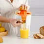 Taurus CITRUS UP Exprimidor de cítricos eléctrico para vasos altos, vertido continuo, 0.2L, 40W, 2 conos, color Naranja y Blanco