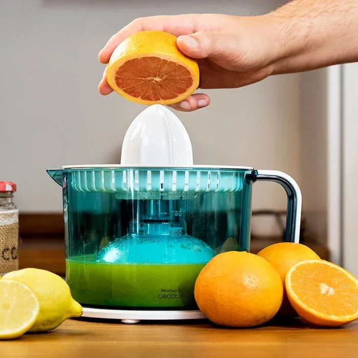 Cecotec ZitrusEasy Basic Exprimidor Eléctrico con Brazo de 40W, Capacidad 1 Litro para Naranjas y Cítricos, Transparente Turquesa y Blanco