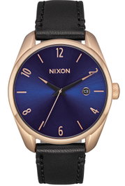 NIXON Reloj Analógico A4732763 con Caja Rosada y Correa de Piel Azul