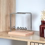 Home Deco Factory Péndulo de Newton Home Deco Factory Altura 15 cm con Base de Madera y Bolas de Metal