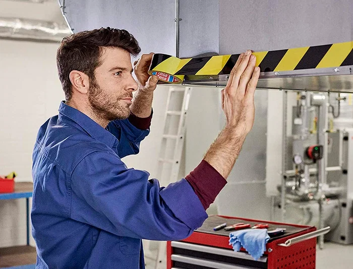 Tesa Cinta Adhesiva de Seguridad para Delimitación Amarilla y Negra, Polipropileno 6636, 50 mm x 66 m