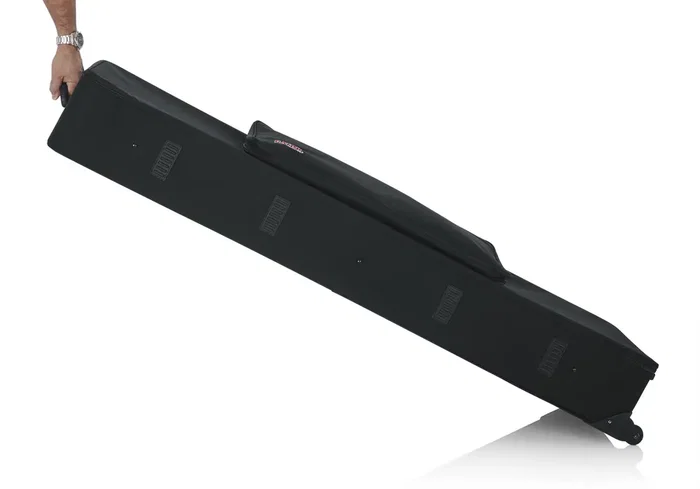 Gator Estuche ligero con ruedas para teclado de 88 notas estrecho y extralargo - Negro