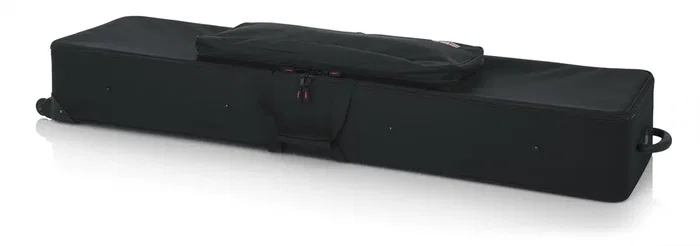 Gator Estuche ligero con ruedas para teclado de 88 notas estrecho y extralargo - Negro