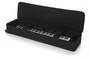 Gator Estuche ligero con ruedas para teclado de 88 notas estrecho y extralargo - Negro