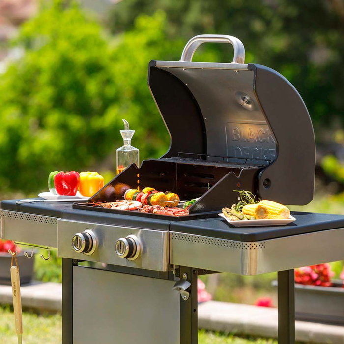 Black+Decker BXOG7200E Barbacoa de Gas con 2 Quemadores, Encendido Automático, Tapa con Termómetro, Parrilla de Hierro Fundido y Compartimento para Cilindro, 116 x 58 x 118,5 cm
