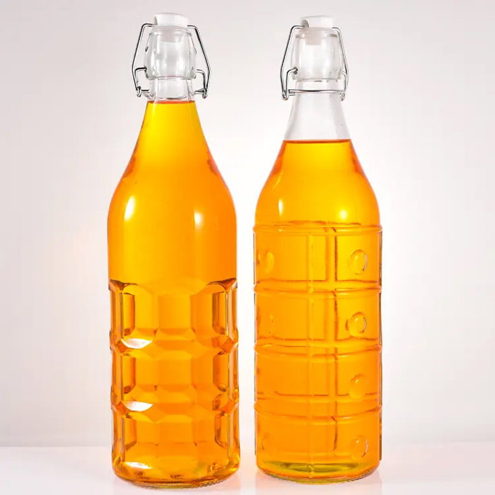 Inde Botella Transparente con Tapon Hermetico 1L 8.6x31cm (12 Unidades)