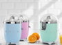 Smeg CJF11PKEU Exprimidor de cítricos eléctrico Rosa