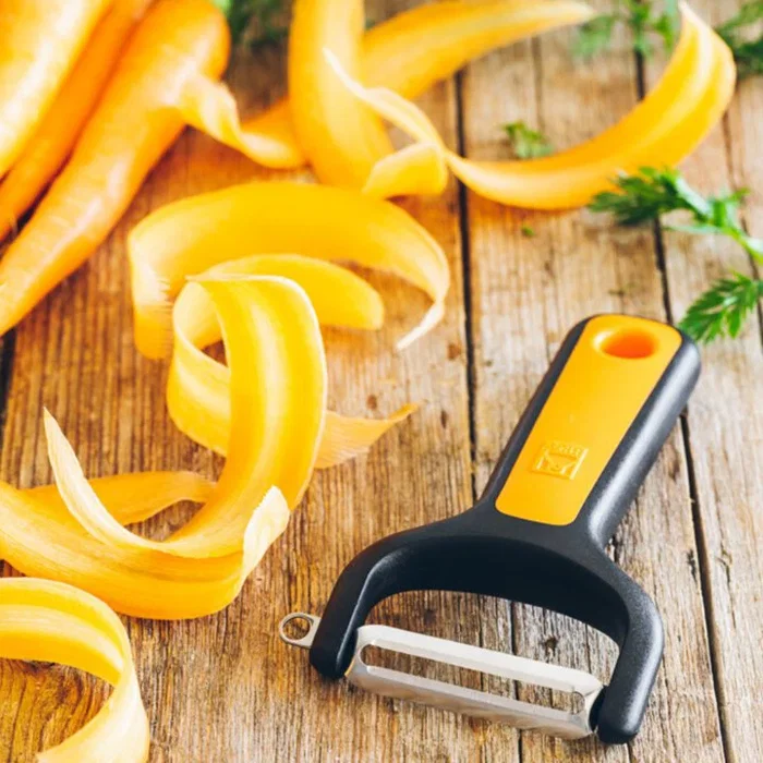 BRA A195013 Pelador Liso en Y para Frutas y Verduras - Pelador de acero inoxidable, corte extrafino, con punzón, color Negro, Naranja, Plata