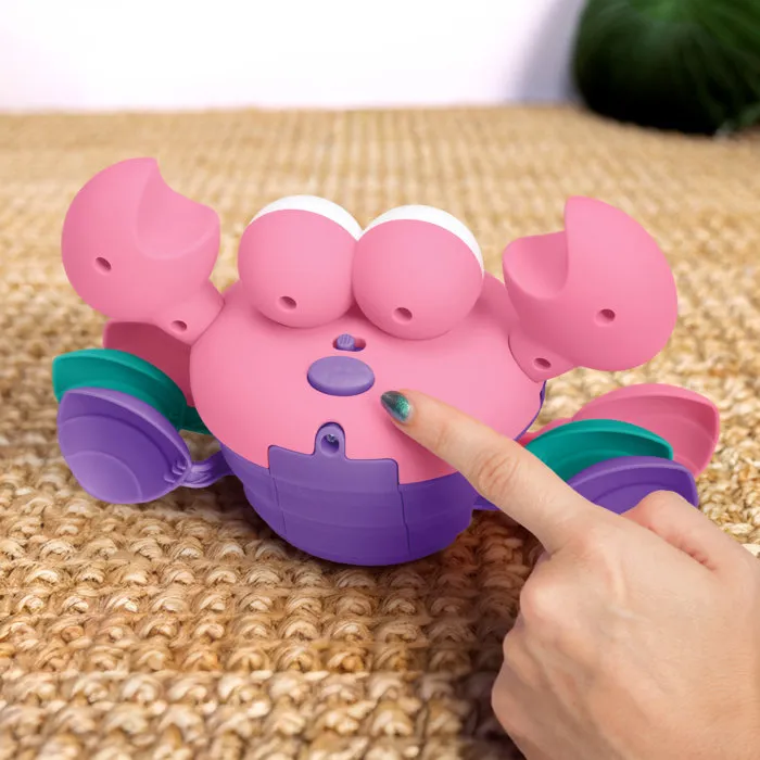 Bright Starts BRI17635013 Cangrejo Musical para Bebés 6 Meses+, Juguete de Desarrollo Motor con Sensores de Obstáculos, Rosa