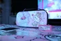Konix Kit de Accesorios Nintendo Switch Hello Kitty con Protector Pantalla, Funda, Auriculares y Paño de Limpieza, Multicolor