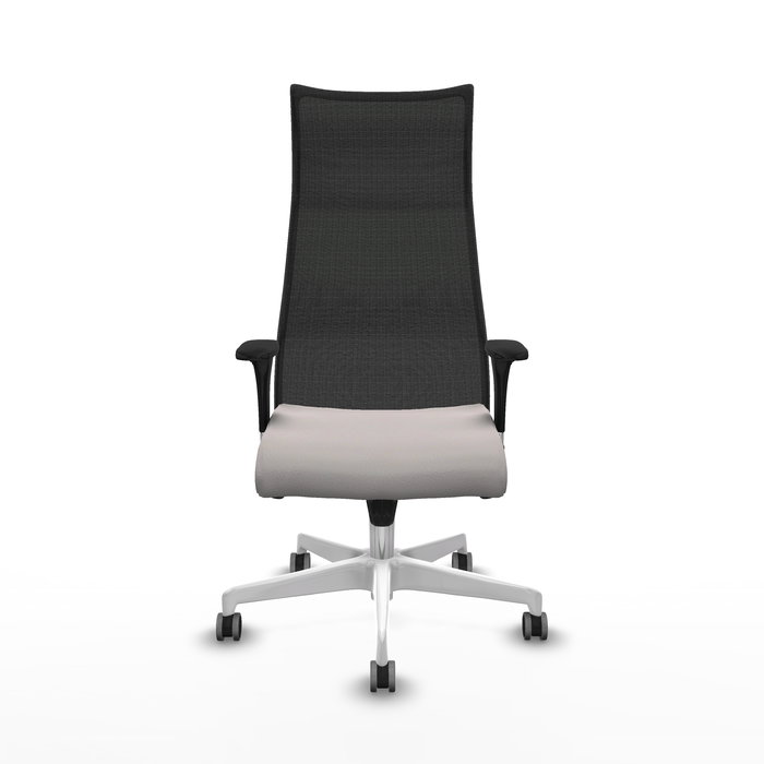 Sillón Albacete con mecanismo Sincro tapizada con Similpiel color Blanco y malla color Negro. Equipado con Base poliamida blanca, Brazos 1D y Ruedas 65 mm parqué