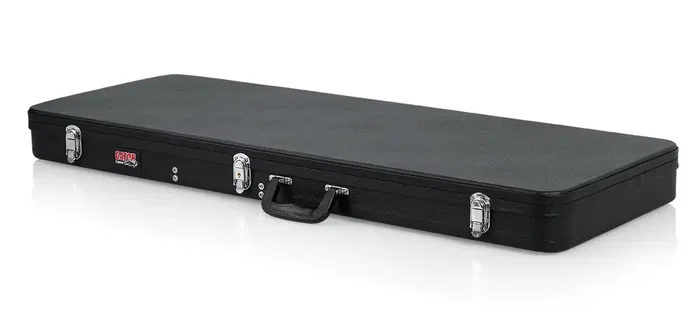 Gator Estuche rígido de madera para guitarras de estilo Jaguar - Negro Gator Estuche rígido de madera para guitarras de estilo Jaguar - Negro