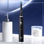 Braun Oral-B iO 6 Cepillo Dental Eléctrico Recargable Negro con 2 Recambios Cabezal y Estuche de Viaje