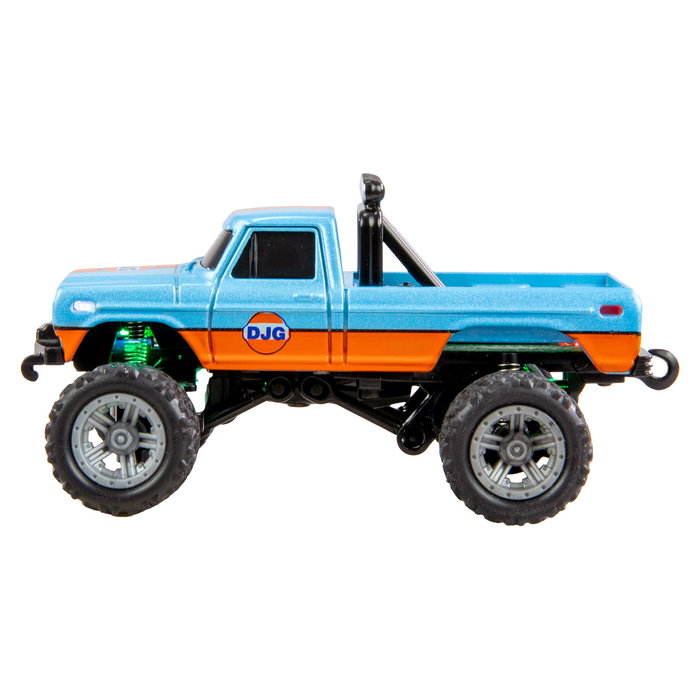 AMEWI 22698 Camión Monstruo RC 1:64 RTR Listo Para Usar, Efectos de Luz, Radio Control 2.4GHz, Color Azul/Naranja, 8 km/h, Con Batería Recargable
