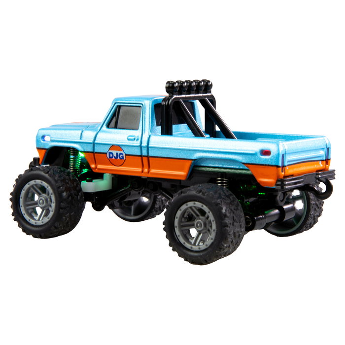 AMEWI 22698 Camión Monstruo RC 1:64 RTR Listo Para Usar, Efectos de Luz, Radio Control 2.4GHz, Color Azul/Naranja, 8 km/h, Con Batería Recargable