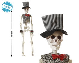 Figura de esqueleto con sombrero a rayas y pajarita roja