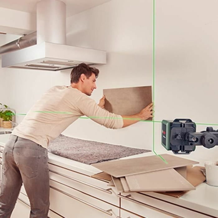 Bosch Quigo + Láser de líneas cruzadas con alcance de 7 m, trípode y pilas