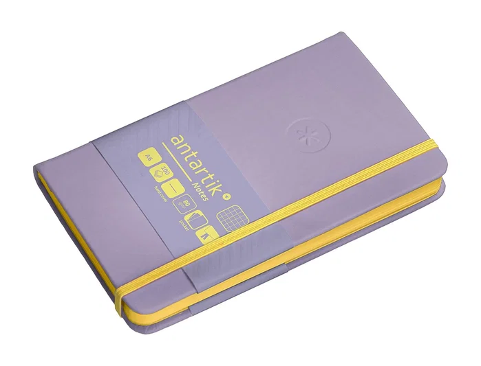 Antartik Cuaderno A6 Tapa Dura Hojas Cuadriculadas Morado y Amarillo 100 Hojas 80gr FSC Antartik Cuaderno A6 Tapa Dura Hojas Cuadriculadas Morado y Amarillo 100 Hojas 80gr FSC