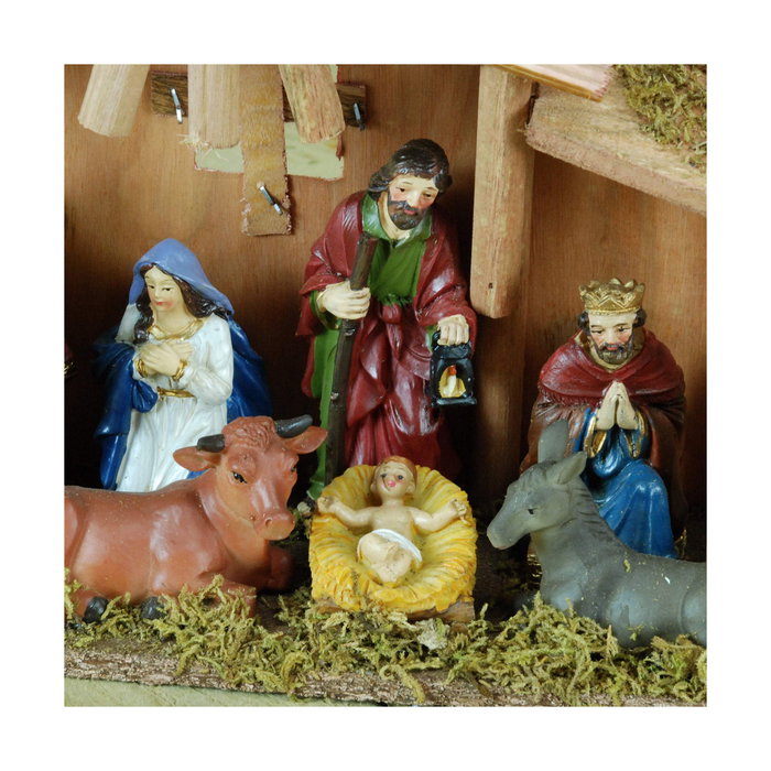 Nacimiento de belén con 8 figuras y musgo