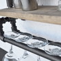 Hanah Home Boruraf104 Estantería de tubo rústica moderna con botellero, madera de abeto y metal, Nogal y negro, 60x67x17 cm