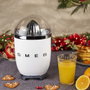 Smeg CJF11WHEU Exprimidor de cítricos Blanco