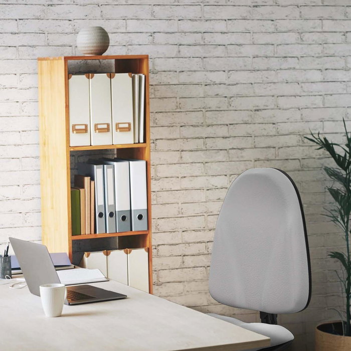 Silla de oficina Algarra con mecanismo Contacto permanente básico tapizada con Similpiel color Naranja. Equipada con Base poliamida negra, Sin brazosy Topes