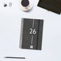 Finocam Agenda Espiral E5 Año 2026, 117x181 mm, 1 Día por Página, Tapa de Polipropileno Negro con Elástico, Información Anual y Contenidos Extra