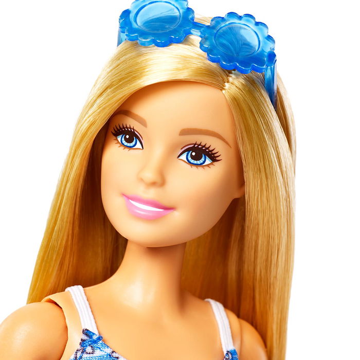 Barbie Muñeca Fashionista con 4 Modas JCR80 Mattel