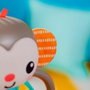 Bright Starts Juguete sonajero musical Giggle Monkey con captura fácil Oball