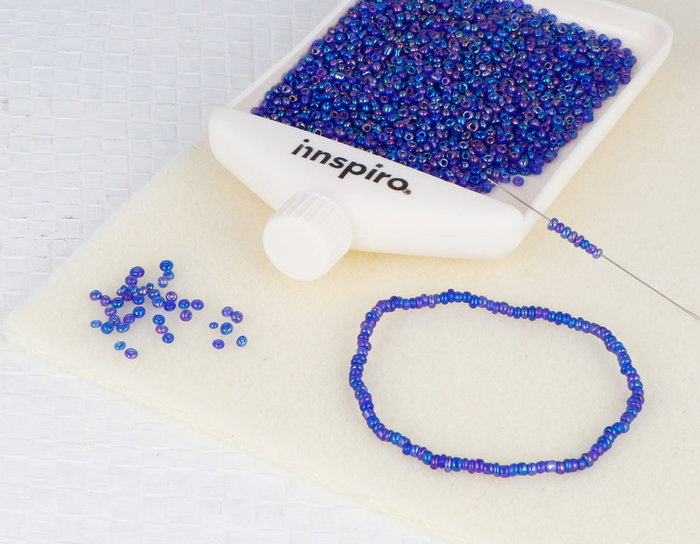 Innspiro Rocalla de vidrio redonda aurora boreale azul marino 2,3mm 120g