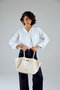 Vince Camuto Bolso de Mano Beige en Piel de Polivinilo Elegante y Duradero