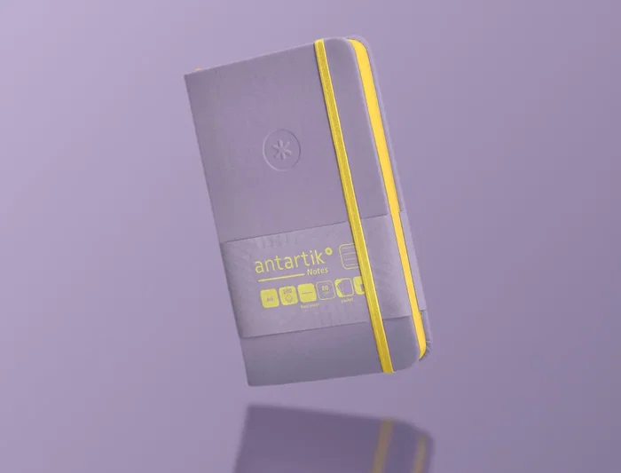 Antartik Cuaderno A6 Tapa Dura 100 Hojas Rayas Morado y Amarillo 80gr FSC